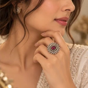 Close-up of handmade 925 sterling silver floral ruby ring