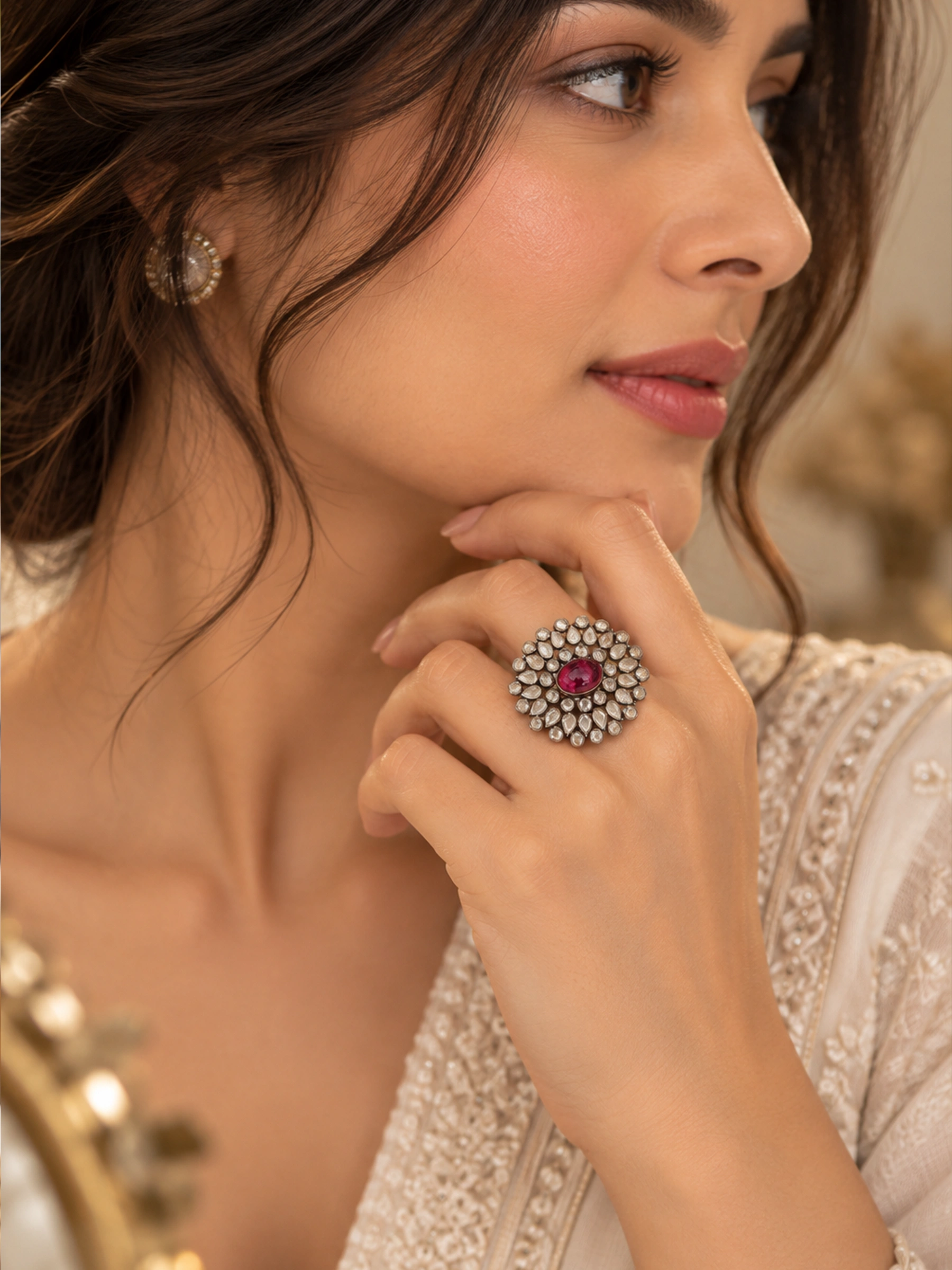 Close-up of handmade 925 sterling silver floral ruby ring